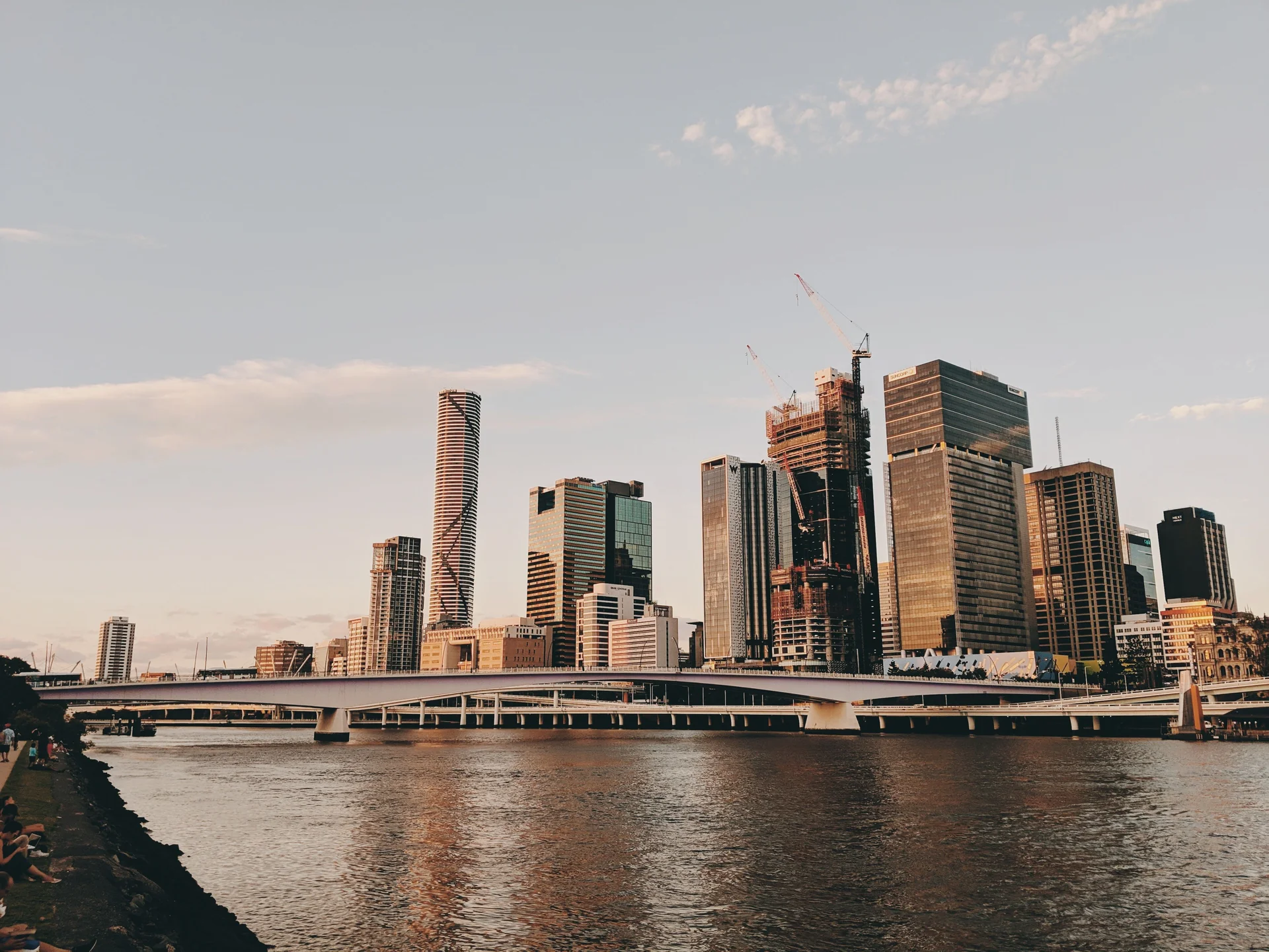 Brisbane skyline viewed across the river in warm evening light